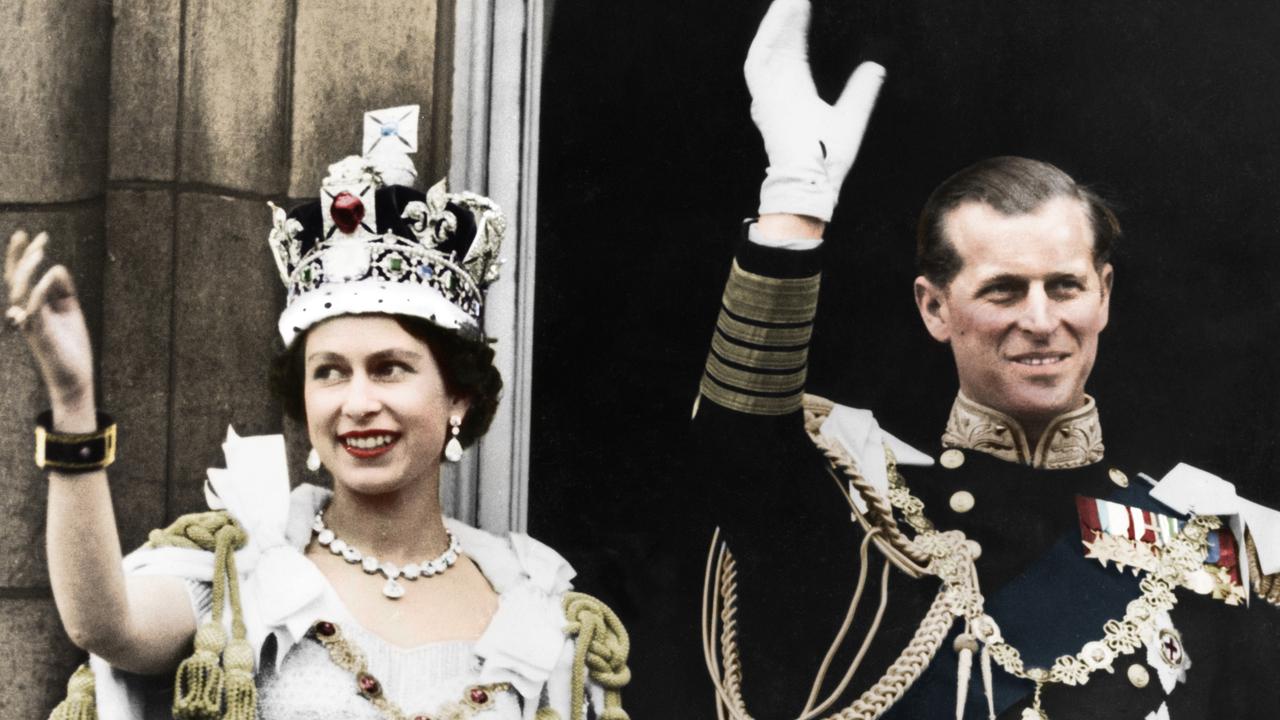 Queen Elizabeth II and the Duke of Edinburgh on the day of their coronation at Buckingham Palace in 1953. Picture: Getty Images