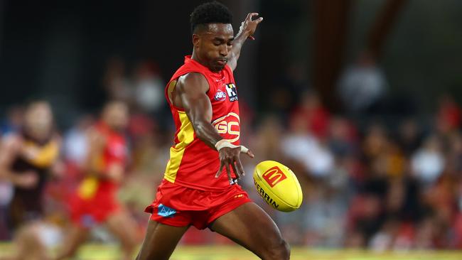 Hewago Oea of the Suns kicks during the round 15 AFL match between Gold Coast Suns and Hawthorn Hawks at Heritage Bank Stadium, on June 25, 2023, in Gold Coast, Australia. Picture: Chris Hyde/Getty Images