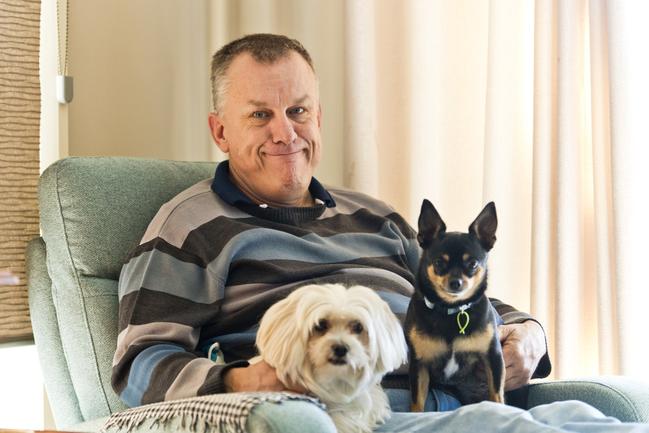 Richard Morris, with his dogs Minnie (left) and Josie, hopes the light up the night event will raise awareness of people who live with Fragile X syndrome (FXS), Monday, July 20, 2020. Picture: Kevin Farmer