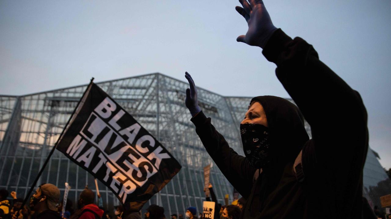 Black Lives Matter demonstrators protests outside the Case Western Reserve University and Cleveland Clinic during the first 2020 presidential debate in Cleveland, Ohio on September 29, 2020. Picture: MEGAN JELINGER / AFP.