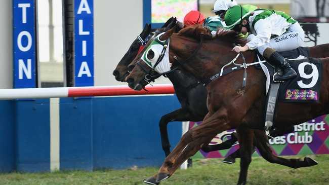 Jockey Rachel King steered home Trust Me to victory in the Sir James Kirby Handicap (1000m) for trainer Brett Partelle in a photo finish ahead of All Cylinders and Under The Thumb.