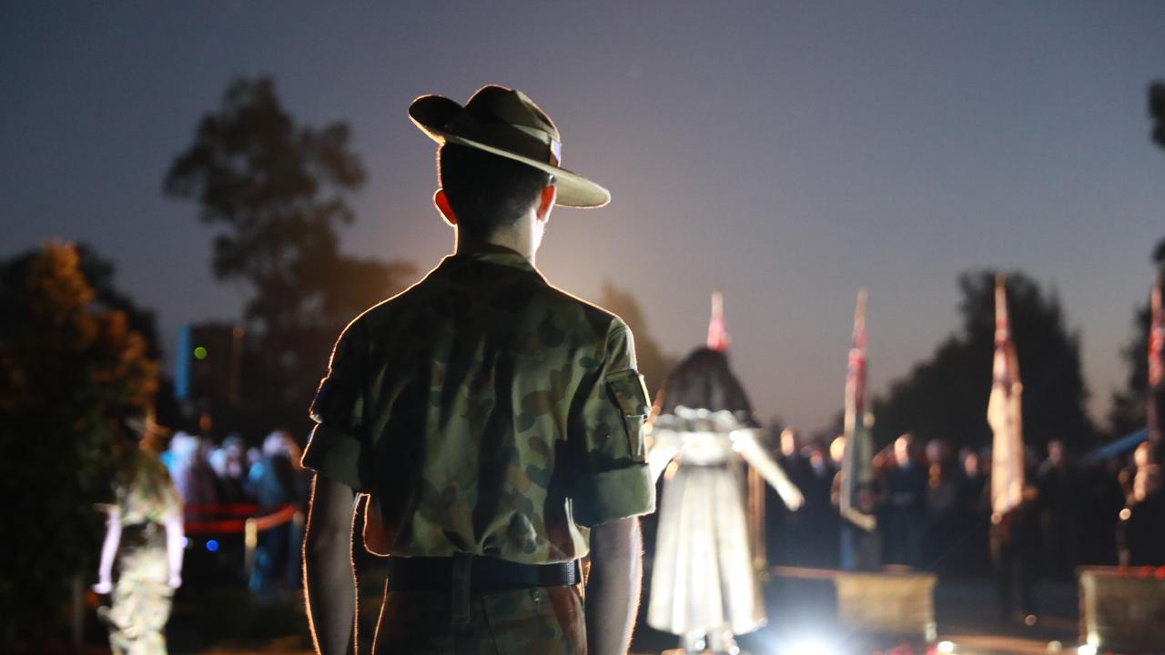 Army cadet unit member stands at the attention at ANZAC Day Dawn service at Pinegrove Memorial Park in Minchinbury. Picture: AAP 