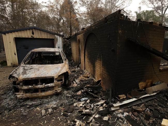 Property destroyed by the Hillville fire on Metz road near Old Bar in the Mid North Coast region of NSW, Tuesday, November 12, 2019. Parts of NSW face catastrophic bushfire danger on Tuesday, with residents in bushland areas told to leave early rather than wait for fresh fires to start. (AAP Image/Darren Pateman) NO ARCHIVING