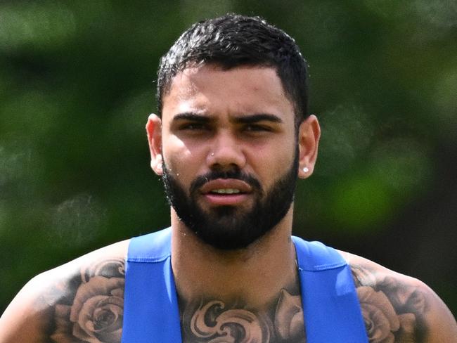 MELBOURNE, AUSTRALIA - NOVEMBER 17: Tarryn Thomas of the Kangaroos runs laps during a North Melbourne Kangaroos AFL training session at Arden Street Ground on November 17, 2023 in Melbourne, Australia. (Photo by Quinn Rooney/Getty Images via AFL Photos)