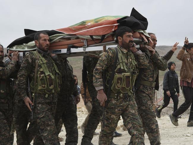 Yezidi funeral attended by Shinga Resistanc-Units on Sinjar Mountain, Iraq