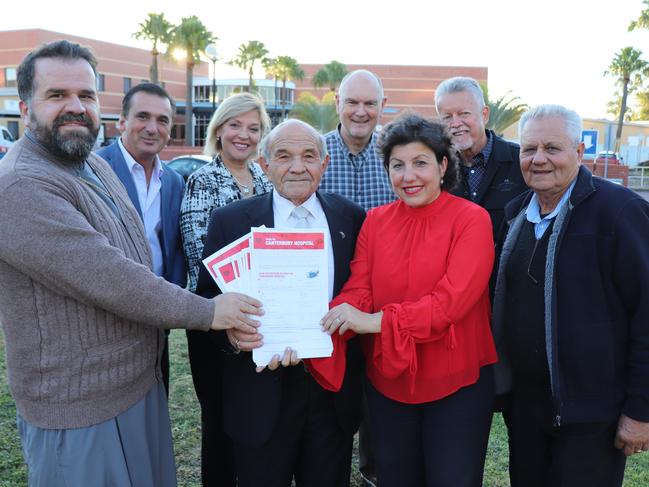 Canterbury state Labor MP Sophie Cotsis, second right, with community members outside Canterbury Hospital. They have a petition calling for more hospital funding and resources.