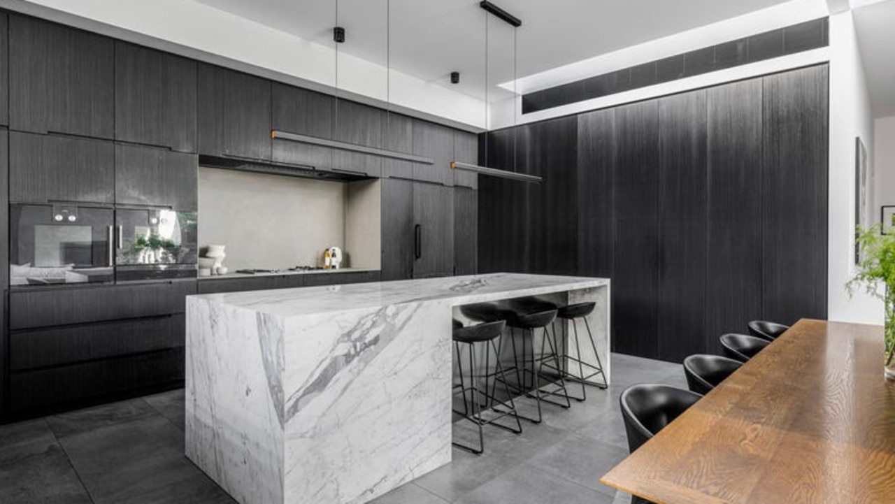 A marble bench takes centre stage in the kitchen.