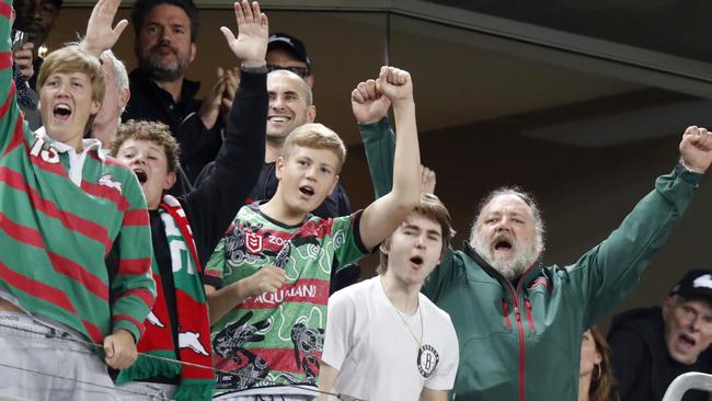 Russell Crowe celebrates a try by South Sydney as he watches the NRL game between the Rabbitohs and the Roosters at Stadium Australia, Sydney Olympic Park. Picture: Jonathan Ng