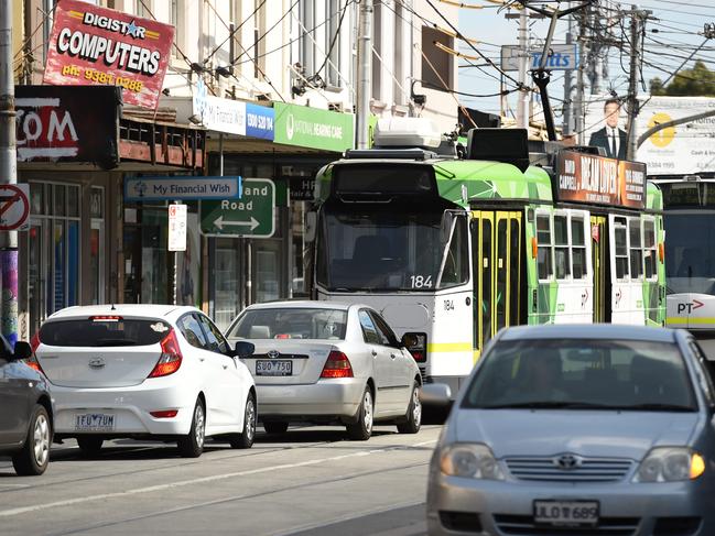 Trams and cars would be left to share one lane each way.