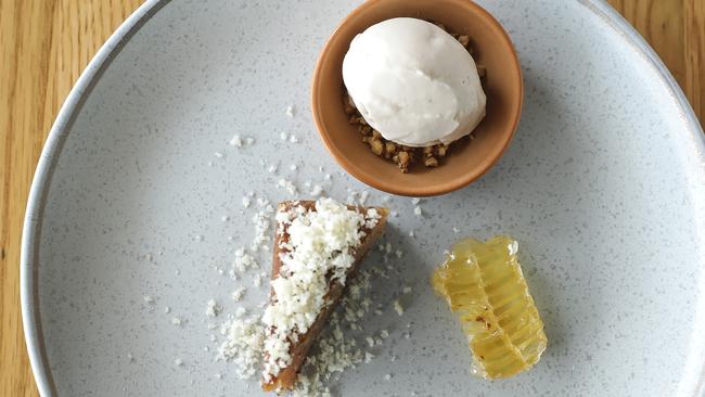 Simon Gloftis' walnut and macadamia cake with yoghurt and halva ice cream. Pic Mark Cranitch.