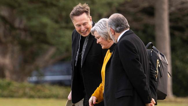 Tesla CEO Elon Musk walks with US Secretary of Commerce Howard Lutnick and White House Chief of Staff Susie Wiles as they depart the White House in Washington, DC. Picture: AFP