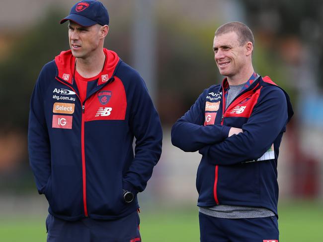 Melbourne coach Simon Goodwin and assistant Matthew Egan . Pic: Michael Klein