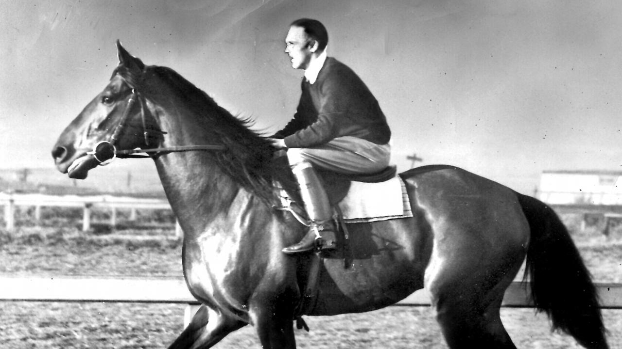 undated : racehorse Bernborough ridden by unnamed stable hand on Jack Bach's Oakey property, Brisbane, regarded as one of Australia's best racehorses of 1940s - sport horseracing history