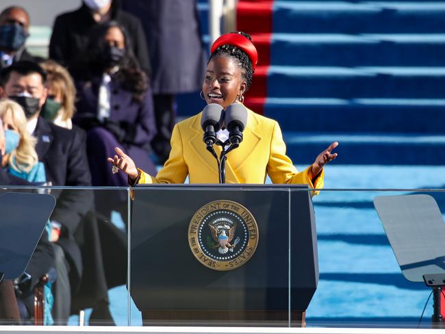 Youth Poet Laureate Amanda Gorman recited verse inspired by the Capitol attack, touching on how democracy “can never be permanently defeated.” Picture: AFP