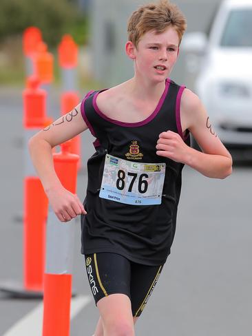 William Hodgman, from the Hutchins School, competes in the run leg of the grade 7 individual boys section.