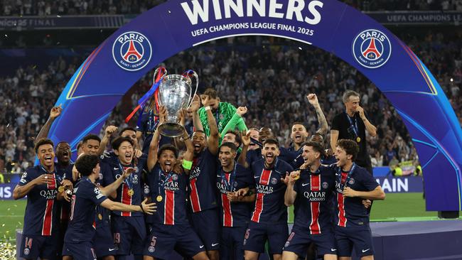 Paris Saint-Germain celebrate winning their first ever Champions League title. (Photo by FRANCK FIFE / AFP). (Photo by FRANCK FIFE / AFP)