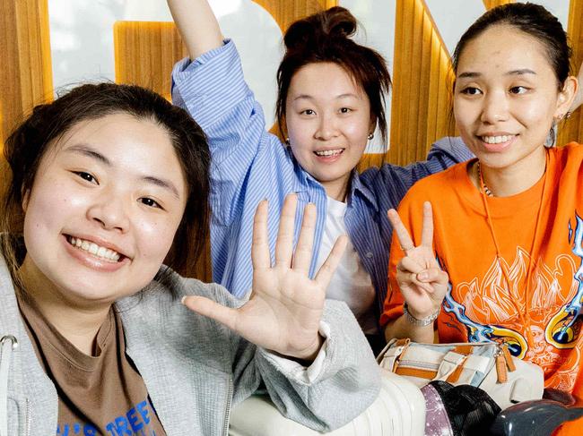 Sheng Yu, Zhang Yitong and Yang Xinyi - International students returning to Brisbane Airport, Monday, February 6, 2023 - Picture: Richard Walker