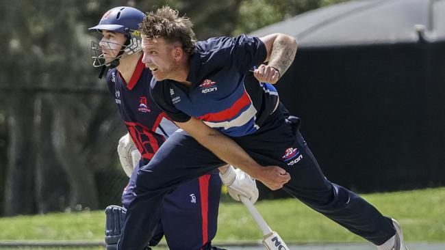 Premier: Jake Reed rolls the arm over for Footscray. Picture: Valeriu Campan