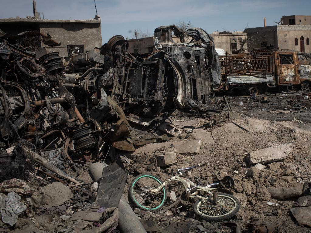 A bike is seen among destroyed vehicles in the final ISIS encampment on March 23, 2019 in Baghouz, Syria. Picture: Chris McGrath/Getty Images