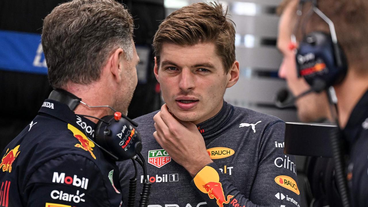 Red Bull Racing's Dutch driver Max Verstappen (C).