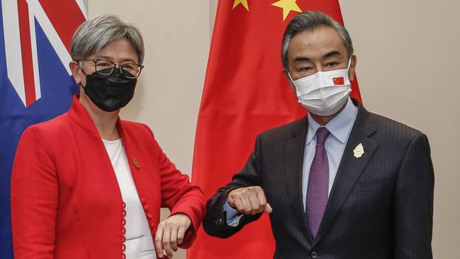 Penny Wong with Chinese Foreign Minister Wang Yi in Bali on Friday. Picture: Johannes P. Christo