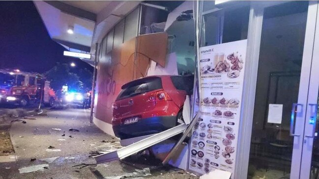 Social media users have shared images of a car crashed into a shopping centre at Newmarket in Brisbane's north.