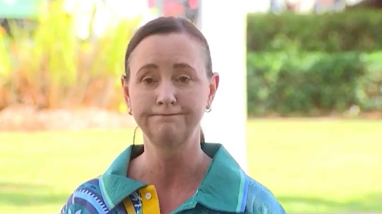 Health Minister Yvette D'Ath is interrupted by an anti-vax protester in Cairns.