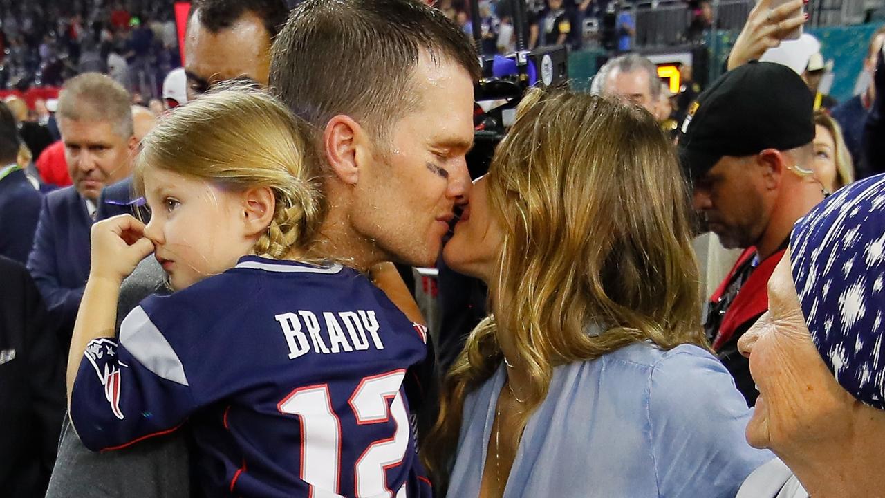 Tom Brady and Gisele celebrate a Super Bowl victory. Photo by Kevin C. Cox/Getty Images.