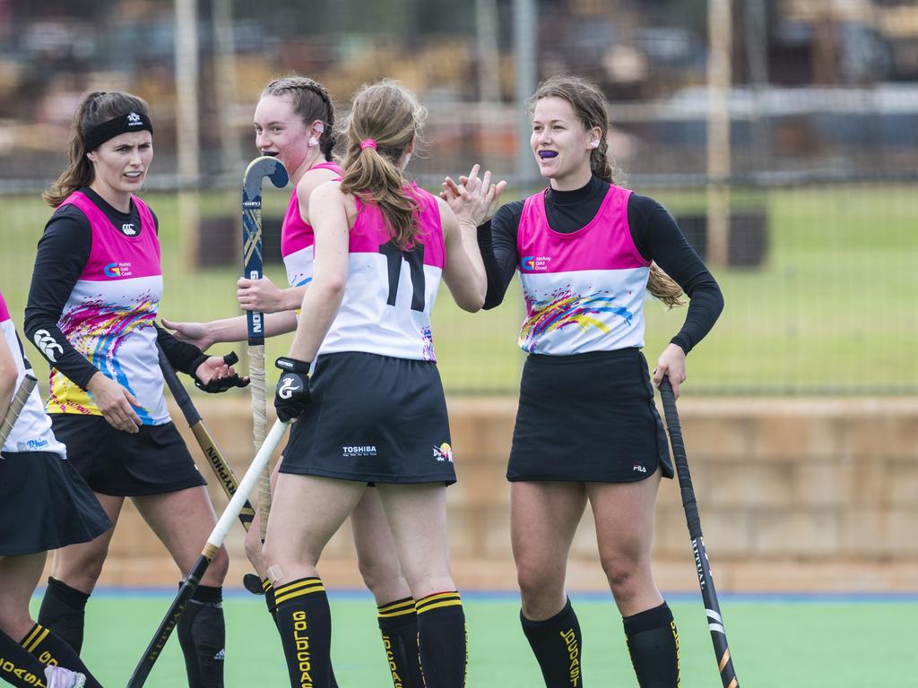 Leigh Thomas (right) celebrates her goal for Gold Coast against Tweed in Hockey Queensland Championships at Clyde Park, Sunday, May 2, 2021. Picture: Kevin Farmer