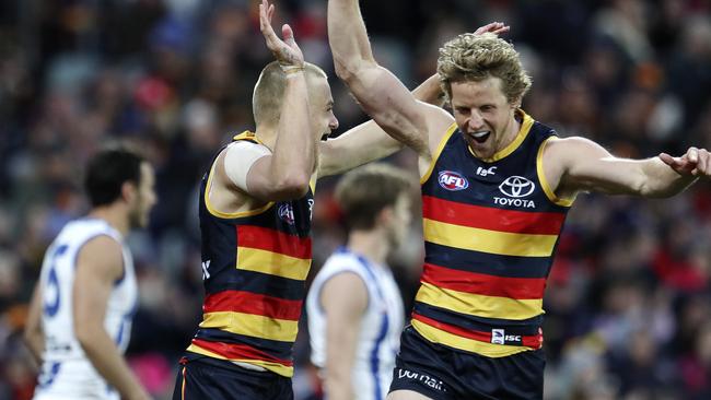 Hugh Greenwood celebrates one of his goals with Rory Sloane. Picture SARAH REED