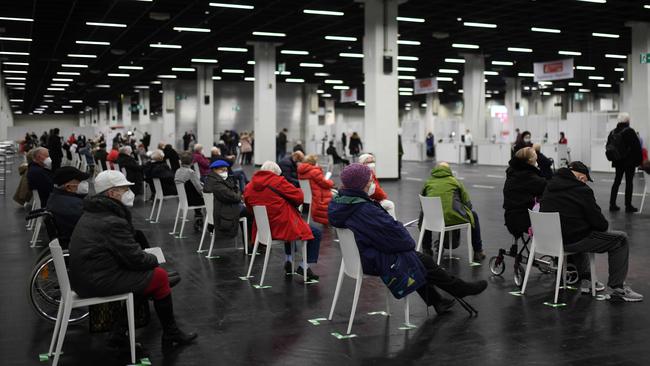 Elderly people wait at the coronavirus vaccination centre in Cologne, western Germany. Picture: AFP