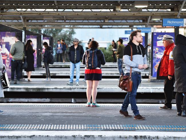 Commuters wait for trains at Richmond station. Picture: Jake Nowakowski