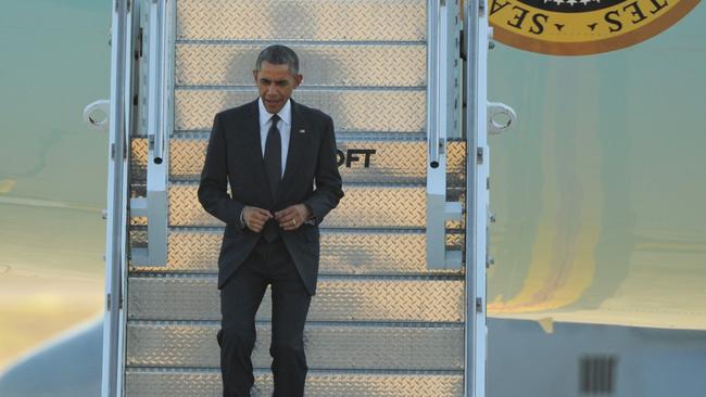 US President Barack Obama disembarks from air force One upon his arrival at Amberley air base Pic: AFP PHOTO / Greg WOOD
