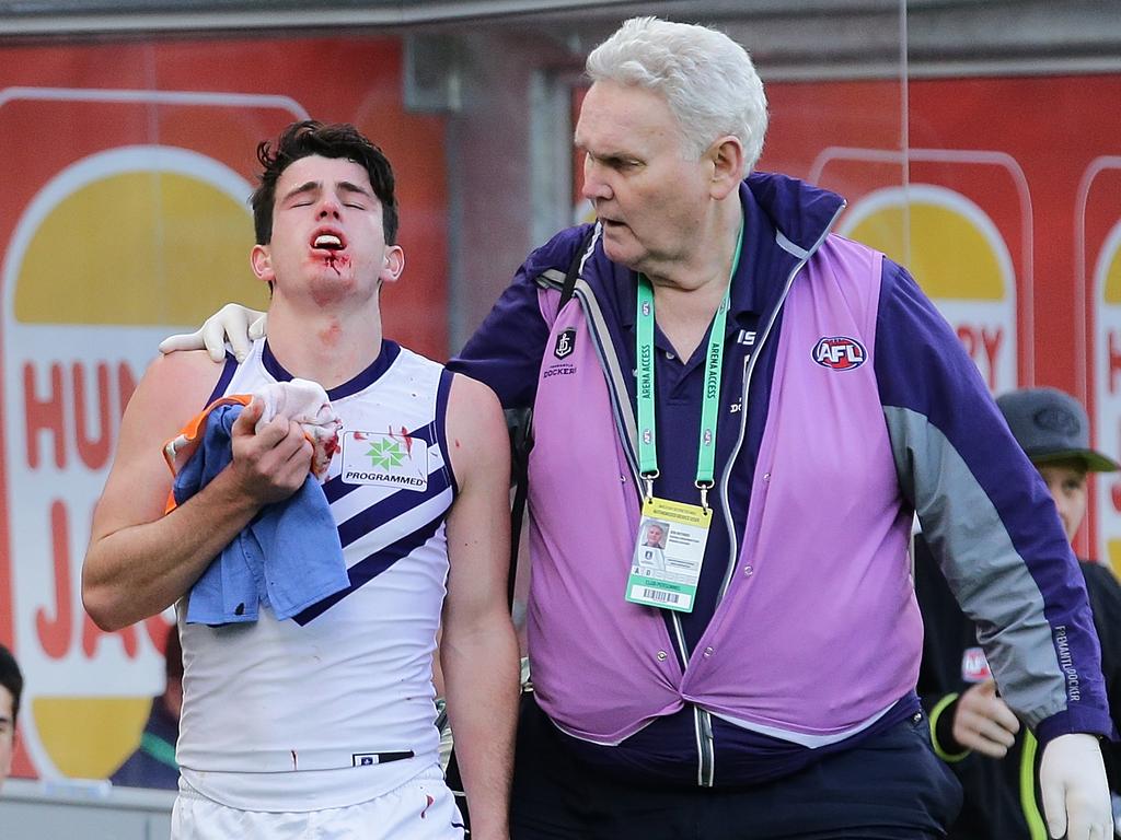 Andrew Brayshaw was left bleeding from his mouth. (Photo by Will Russell/AFL Media/Getty Images)