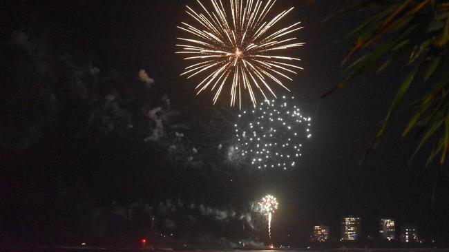 Fireworks light up the night sky over Mooloolaba as thousands turned out to watch and bring in the New Year. Photo: Elizabeth Neil