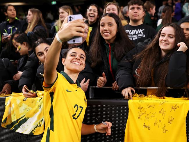 SYDNEY, AUSTRALIA - SEPTEMBER 06: Alex Chidiac of the Matildas poses for selfies with the crowd after the International Friendly Match between the Australia Matildas and Canada at Allianz Stadium on September 06, 2022 in Sydney, Australia. (Photo by Mark Kolbe/Getty Images)