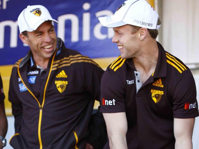 Hawthorn Supporters Day at Glenferrie Oval. Sam Mitchell with his daughters Emmerson (orange) and Scarlett (blue) . Sunday September 29, 2013. PIC MICHAEL KLEINHawthorn Supporters Day at Glenferrie Oval. . Sunday September 29, 2013. PIC MICHAEL KLEIN