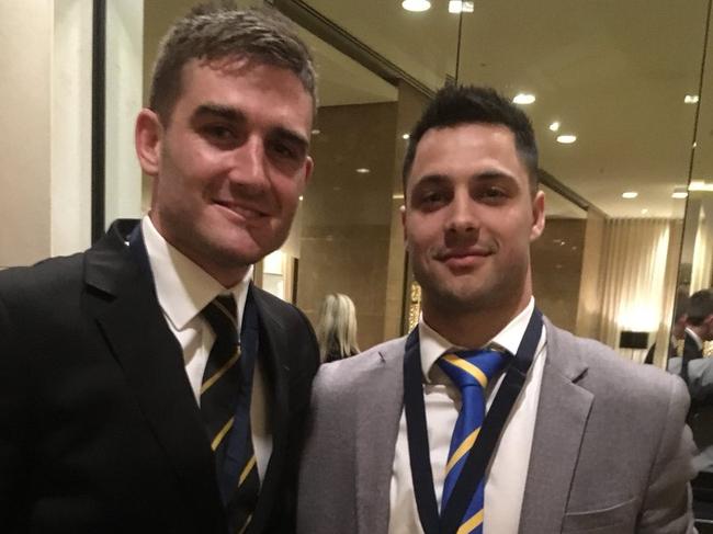 Anthony Miles and Michael Gibbons (right) after sharing the 2018 JJ Liston Trophy.