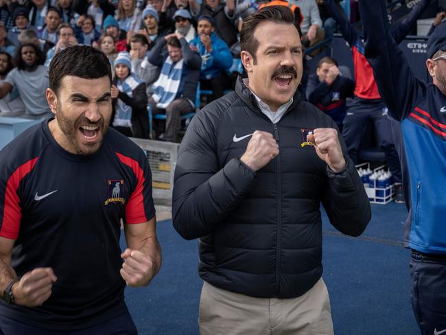 Jason Sudeikis as Ted Lasso (centre) with co-stars and co-writers Brett Goldstein (left) and Brendan Hunt (right).