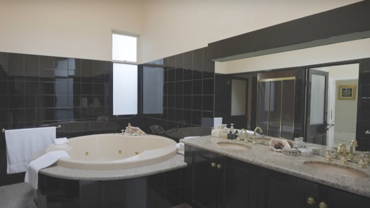 The ensuite has a sunken spa bath and dual vanity.