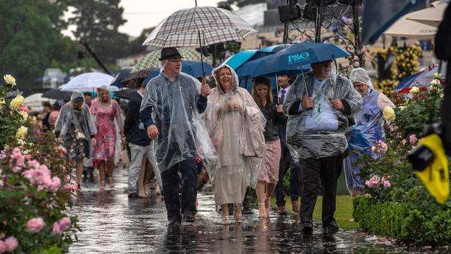 Punters braved the second-wettest Melbourne Cup on record. Picture: Jason Edwards