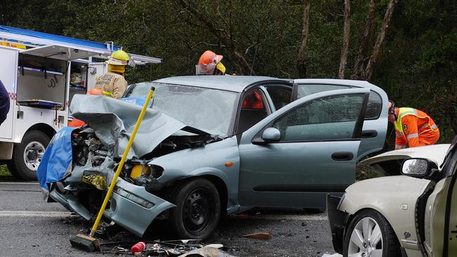 Emergency services were called to Hogbin Drive after the Nissan Pulsar and Ford Falcon collided head-on.