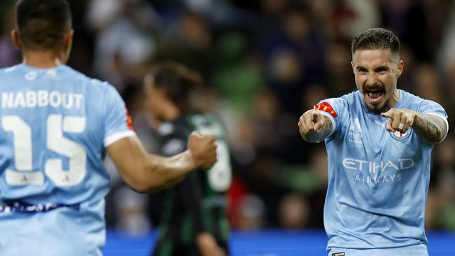 Jamie Maclaren celebrates a goal with Andrew Nabbout. Picture: Jonathan DiMaggio/Getty Images