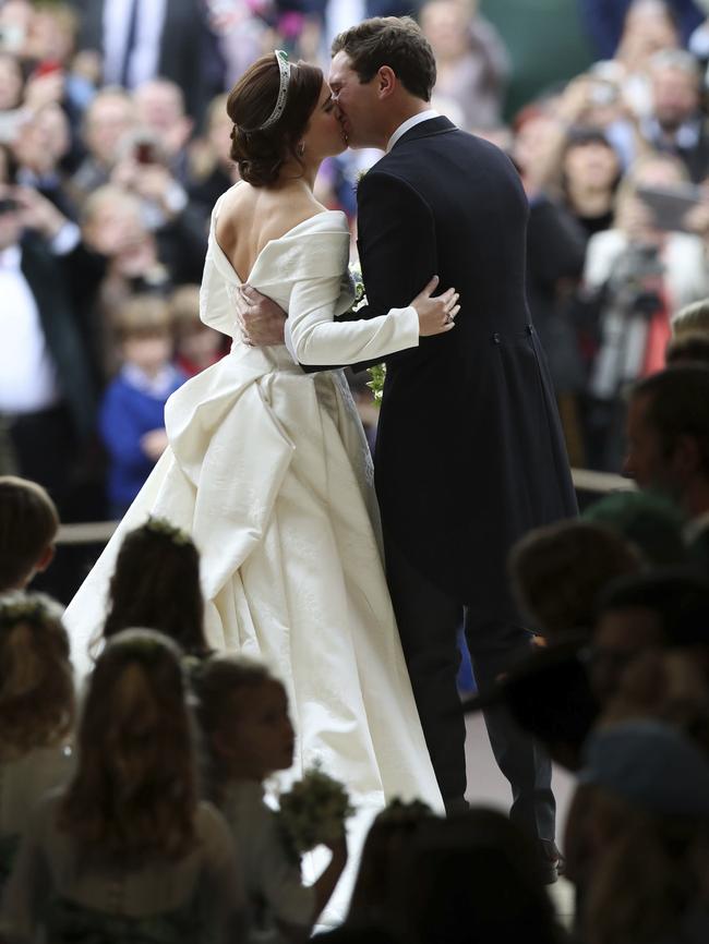 The famous first kiss on the steps. Picture: AP