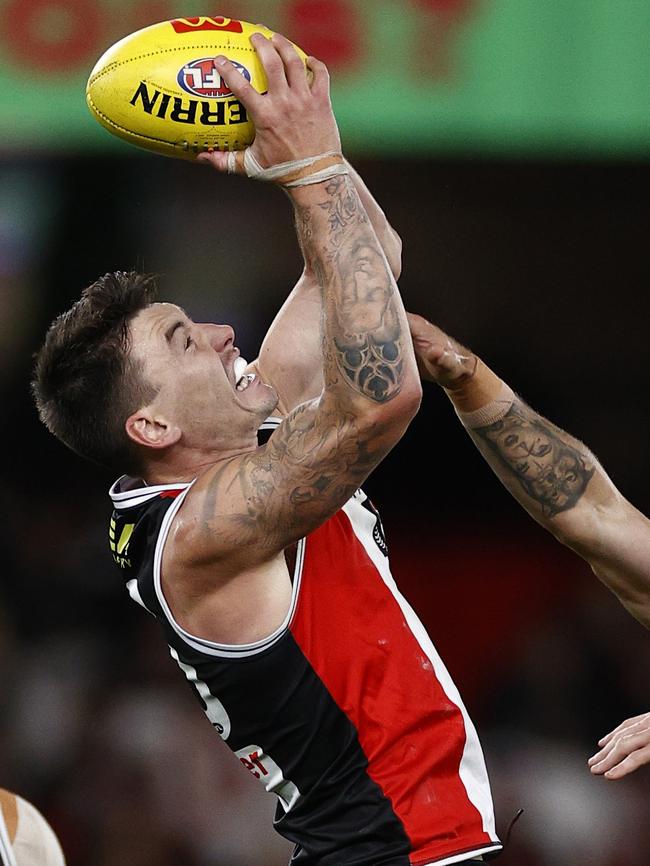 Fellow defender Josh Battle marks strongly against the Suns. Picture: Darrian Traynor/Getty Images