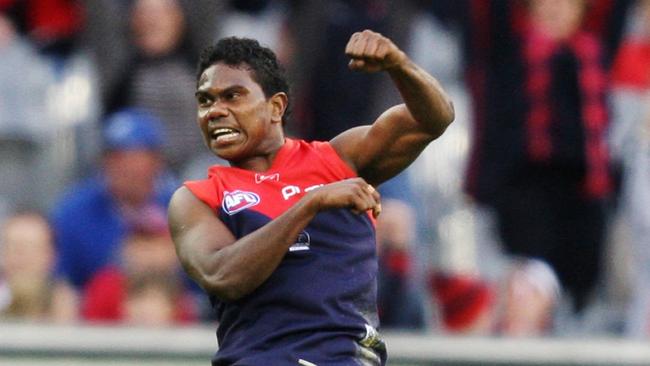 Austin Wonaeamirri celebrates a goal against Fremantle in 2008. He played 31 games for Melbourne between 2008-2011.