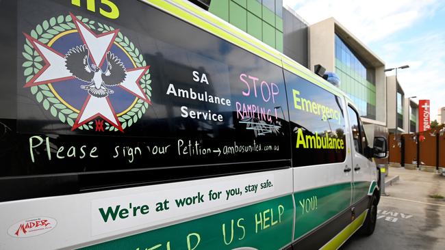 The AEA was ordered to stop chalking messages onto ambulances and lift a “case card ban” amid a bitter industrial dispute with the state government. Picture: NCA NewsWire/Naomi Jellicoe