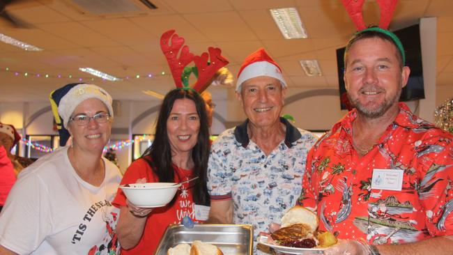 Smiles were also on the menu from Kath Johnston, Carolyn Nocella, Czek Kersevani and Paul Maguire who volunteered at the 2022 Cairns Community Christmas Lunch. Picture: Alison Paterson