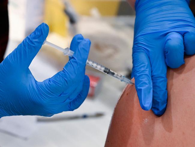 A man receives the Pfizer vaccine in Germany. Picture: Thomas Kienzle/AFP