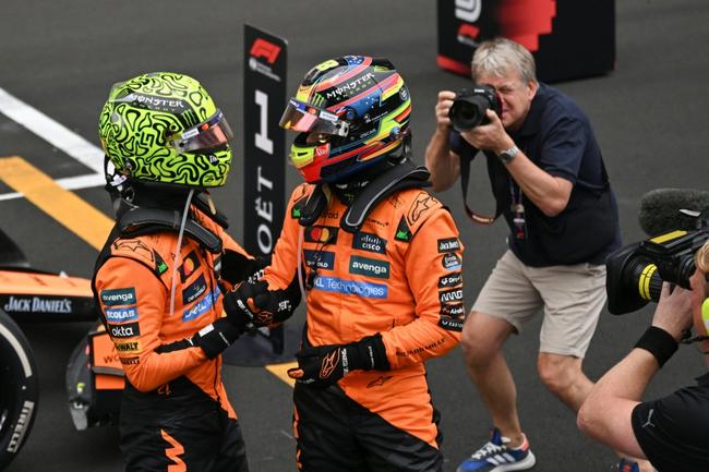 Oscar Piastri (right) and Lando Norris celebrate the McLaren one-two in China